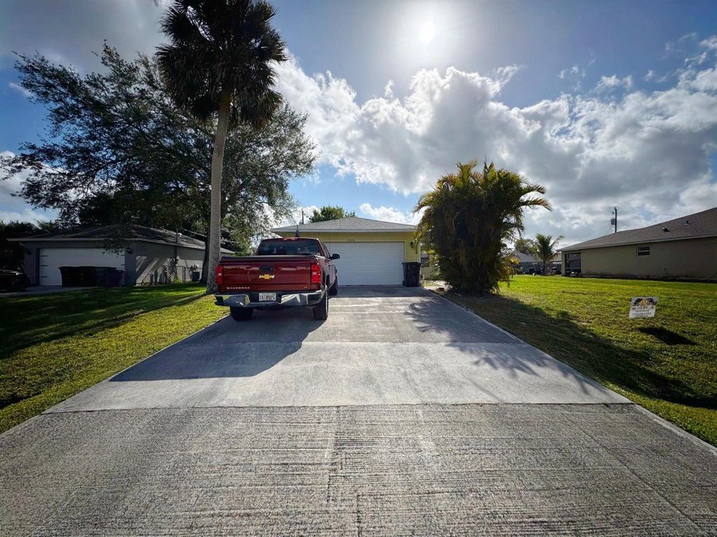 Photo of 1925 SW Ember Street, Port Saint Lucie, FL 34953 (MLS # R11079374)
