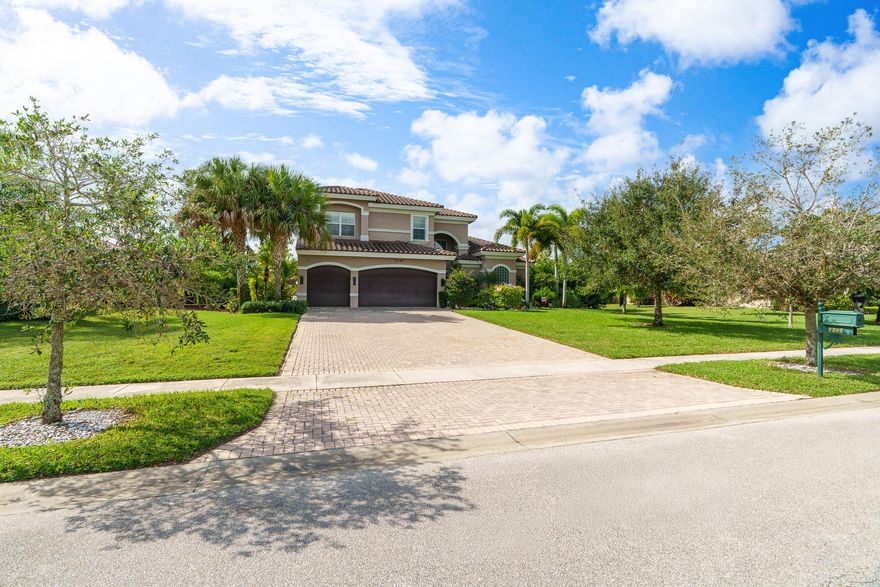 Step onto this stunning contemporary 5B/4Full BA/3 car gar home/half acre lot/guard gated/low HOA/total 4720 sq feet/3843 under air/overlooks spectacular 4 acre nature preserve w lake views in Palm Beach Gardens/highly sought after Preserve at Bay Hill Estates/Soaring ceilings/impact windows/doors/light flows through open floor plan/south facing backyard/magnificent preserve/lake views/Master suite,Guest B/B 1st FL/3B/2B & loft 2nd FL/Custom marble floors in liv area/engineered wood floors/arched entrances/recessed lights/Chef's kitchen/w island/large pantry/custom glass wine cellar/large closets/laundry room/custom landscaping. Golf membership at the Estate course available/not mandatory/tennis/pickleball/basketball/picnic areas that complete this amazing lifestyle/w unparalleled luxury!.