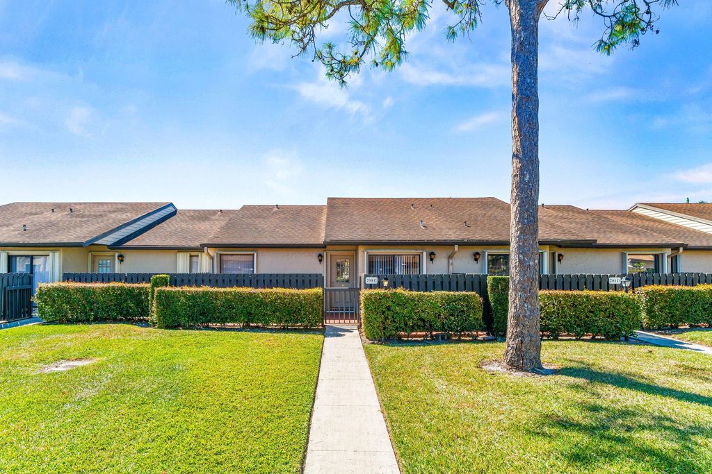 Photo of 704 Sunny Pine Way #C, Greenacres, FL 33415 (MLS # R11167306)