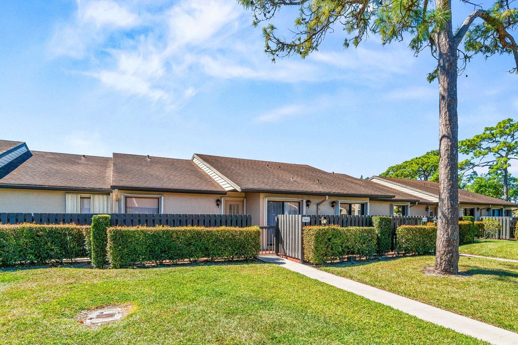 Photo of 704 Sunny Pine Way #C, Greenacres, FL 33415 (MLS # R11167306)