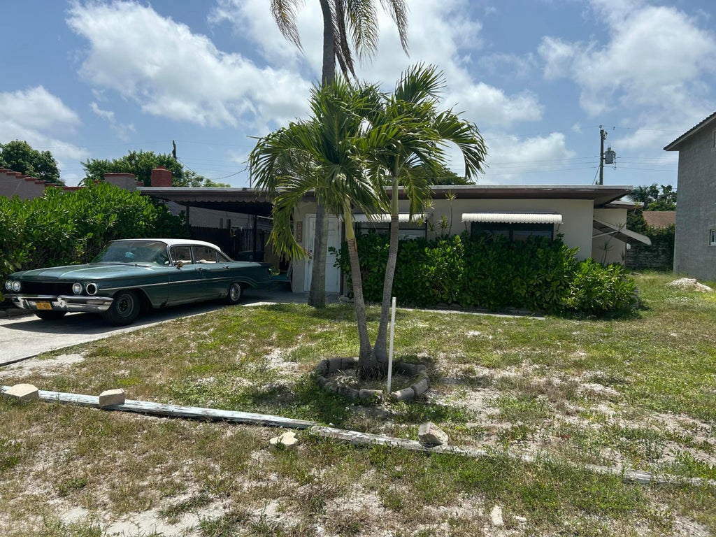Photo of 7785 LOOMIS Street, Lake Worth, FL 33462 (MLS # B26086701)