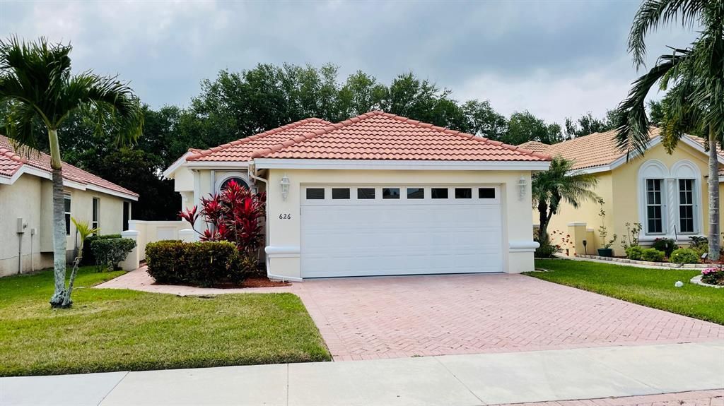Photo of 626 SW Treasure Cove, Port Saint Lucie, FL 34986 (MLS # R10703888)
