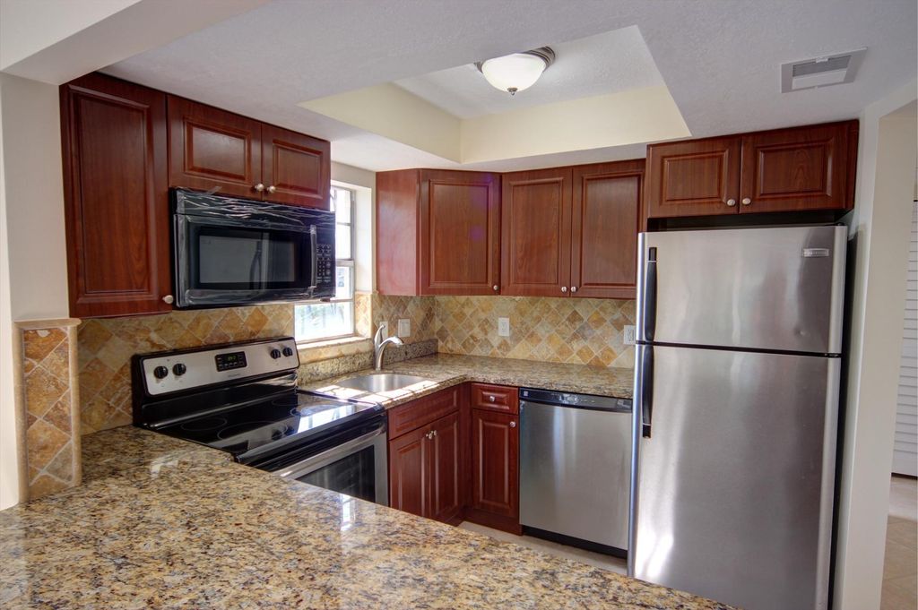 Photo of 342 Southwind Drive #114, North Palm Beach, FL 33408 (MLS # B26023087)