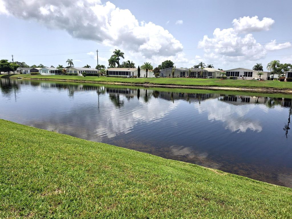 Photo of 8121 Meadowlark Lane, Port Saint Lucie, FL 34952 (MLS # R11097593)