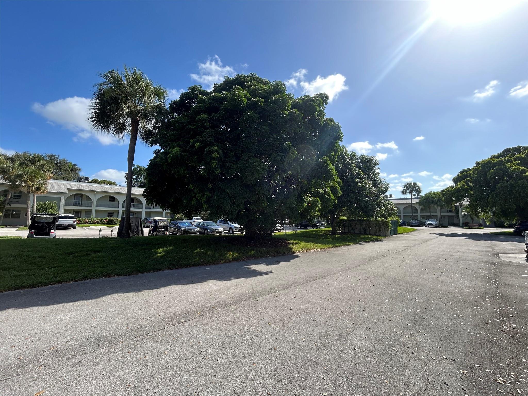 Beautifully Updated Studio/1 Bedroom in this gated and very active 55+ community. The bedroom is separate from living space but has no door. Patio is glassed in and converted to living space. Newer kitchen cabinets and updated bathroom. Peaceful garden view. Community has many amazing amenities, many pools, golf, pickleball, tennis, theater and located close to shopping.