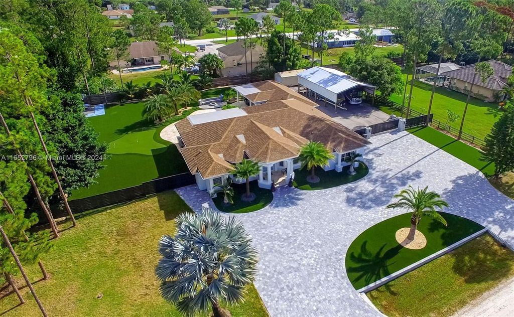 Photo of 14861 85th Road N, Loxahatchee, FL 33470 (MLS # R11132945)