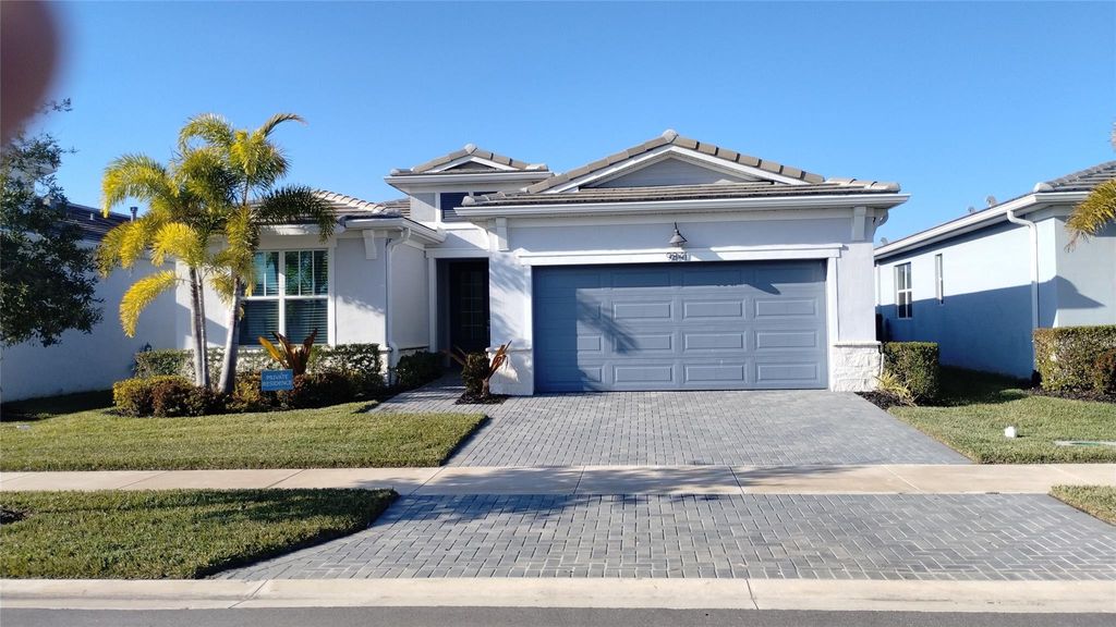 Photo of 9841 SW Isabelline Drive, Port Saint Lucie, FL 34987 (MLS # F10551023)