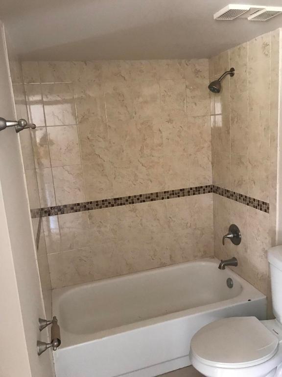 PARADISE COVE AT PALM BEACH LAKES CONDO - Residential Lease