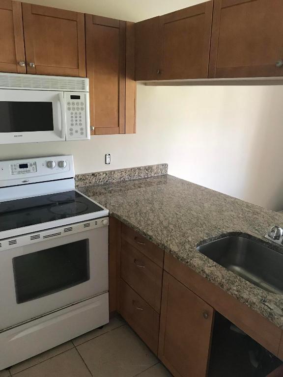 PARADISE COVE AT PALM BEACH LAKES CONDO - Residential Lease