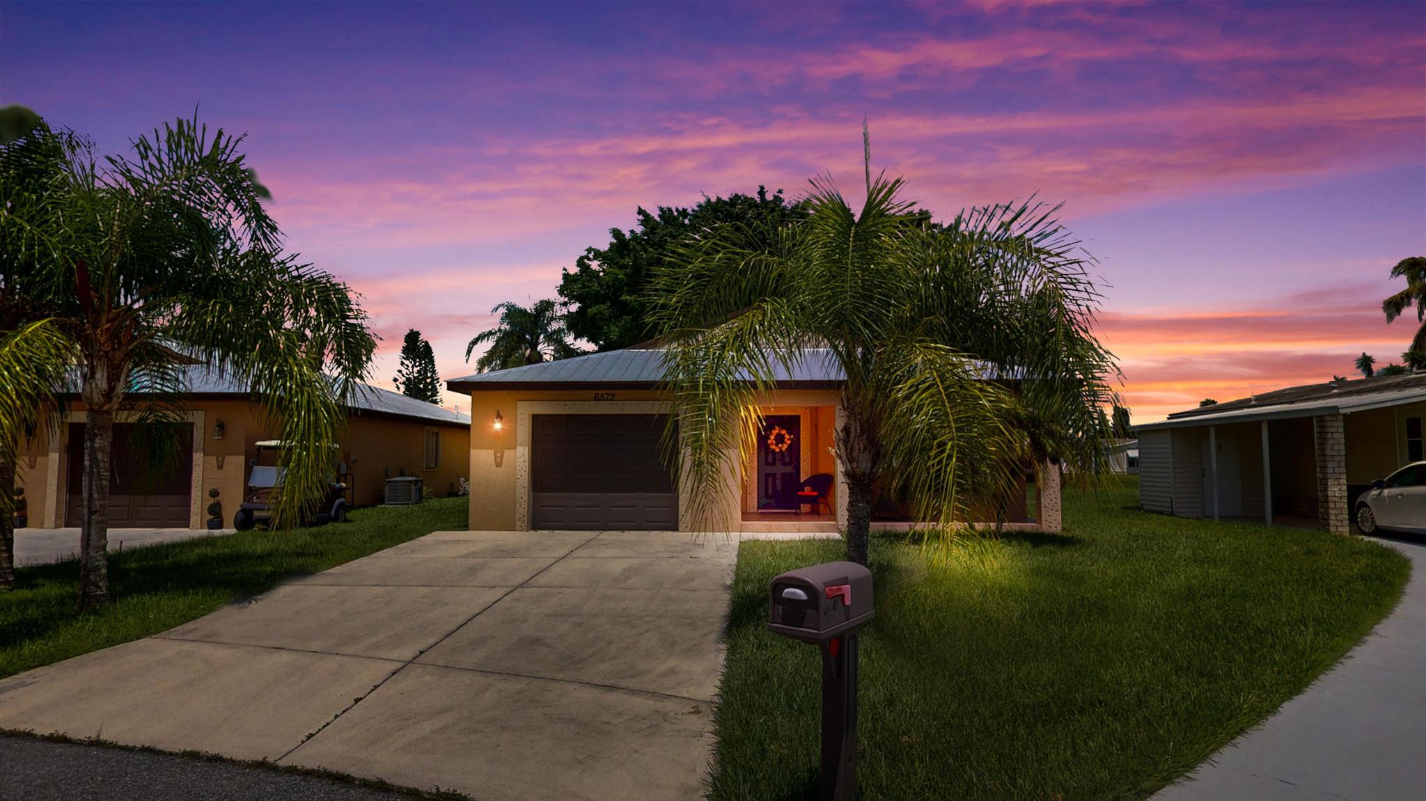 Welcome to Spanish Lakes Fairways, a premier 55+ leasehold community offering resort-style amenities across 435 acres. This 2017 CBS home features 2 bedrooms, 2 bathrooms, and 1,451 sq. ft. of open living space. Inside you'll find a granite and stainless kitchen, spacious living/dining areas, wood-look flooring, and a screened lanai with lake view. Primary suite includes walk-in closet and en-suite bath. Attached garage and covered porch complete this move-in ready home.Community amenities include: clubhouse pavilion, heated resident pool & guest pool, cantina/clubhouse kitchen, auditorium with stage, community library, lounge with bar, arts & crafts, billiards hall, gym & sauna, woodworking, and card room. Outdoor activities include pickleball, lighted shuffleboard, ........