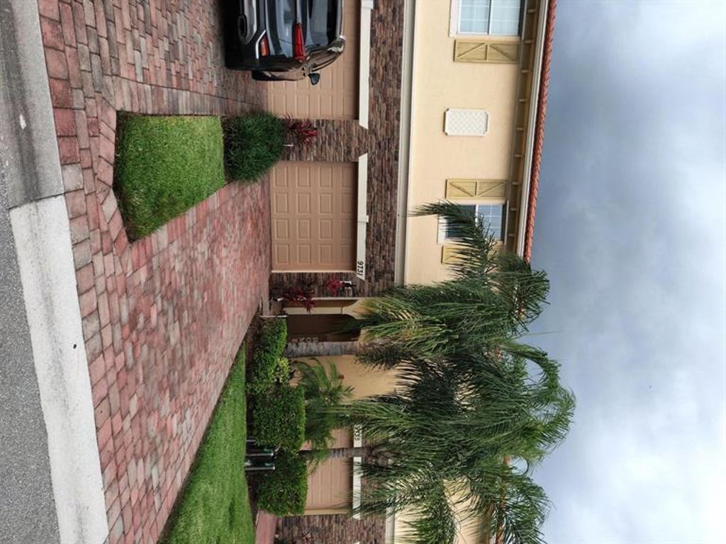 Photo of 9731 SW Purple Martin Way, Stuart, FL 34997 (MLS # R10721768)
