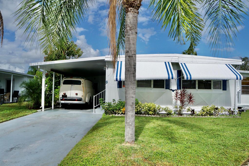 Photo of 8 Placido Lane, Port Saint Lucie, FL 34952 (MLS # R10937773)