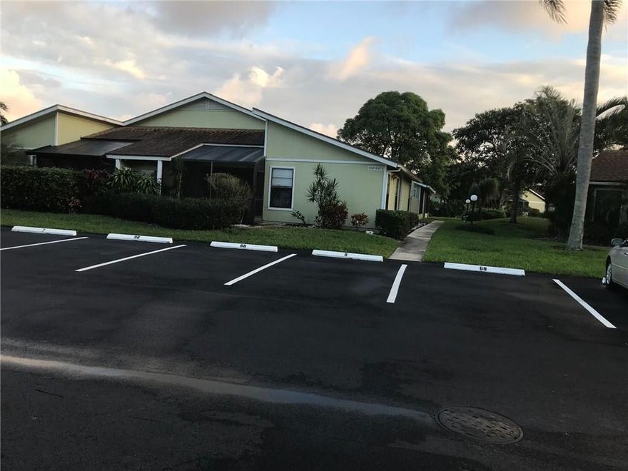Beautiful renovated 2/2 villa in the Lakeside Green community. This home features a great open floor-plan vaulted ceilings and tons of natural lighting.The master bedroom has two closets and an en suite bathroom with vanity. Turn key home located minutes from Clematis, City Place and Palm Beach Outlets. There are two assigned spots for this unit and a number of guest parking spaces. A community pool is located within this cul-de-sac, just steps away. Also, this home is within walking distance of an elem, middle & high school. Two dog restriction per household.