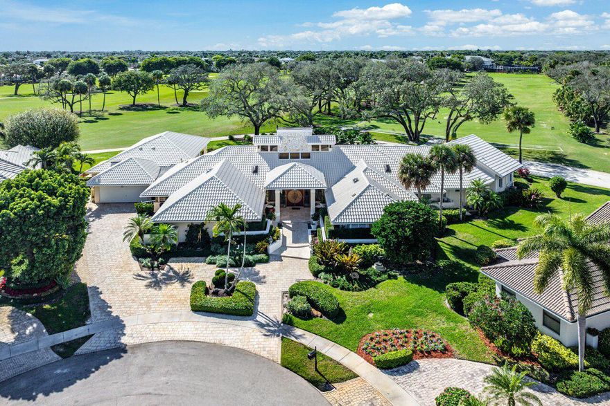Exceptional opportunity in Delaire Country Club! Situated on one of the club's largest home sites of .51 acres and on one of the  most coveted cul-de-sacs, this grand estate home offers nearly 6,000 square feet of living space and a total of almost 9,000 square feet, boasting breathtaking panoramic golf course views. Originally crafted with custom finishes, exquisite millwork, and the finest details, this sprawling ranch-style residence features a massive in-law suite with two bedrooms and a private fitness room, ideal for multi-generational living or extended guests. Additional highlights include a spacious 4-car garage, large driveway, and natural gas connection. While this home has been cherished over the years, it presents an exciting opportunity to bring your vision