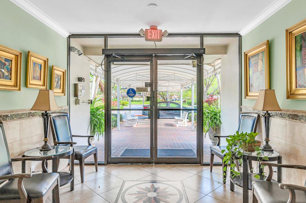 Photo of 3970 Oaks Clubhouse Drive #401, Pompano Beach, FL 33069 (MLS # B26003343)