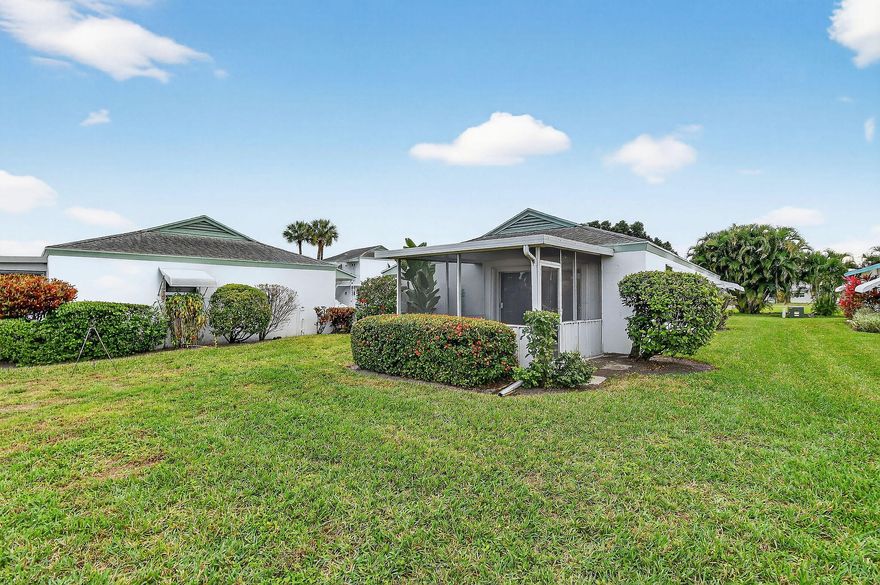 This Immaculate 1 story Villa has a screened porch for outside enjoyment, Interior features an open concept floor plan, freshly painted rooms, tile floors, paneled interior doors with decorative plantation shutters at Impact Windows throughout. A new exterior door and easy  accordion shutters have been installed on the Patio/Porch sliders.  A new water heater was installed 2/2026, bath is freshly appointed, Washer/Dryer and no shortage of closet space.   ''Meridian Park'', a 55+ Community is being recognized by active Seniors  to relocate to.  Promenade shopping center is a short walk away, many restaurants, Publix, Quest, Fitness Center. Plus enjoy the community salt water softened heated pool, shuffleboard, library, social activities, BBQ area, a community room, too! Come join in!!