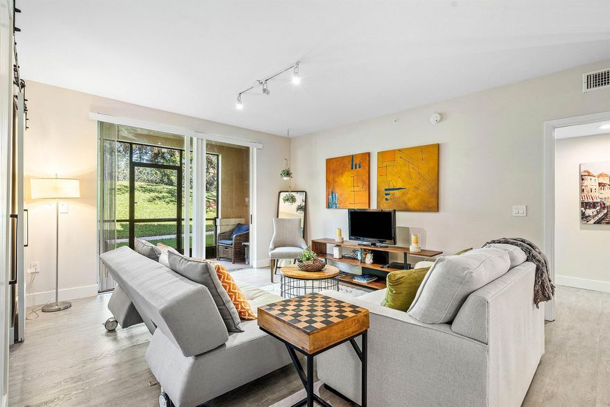 This fully renovated 3-bedroom, 3-bathroom ground-floor apartment offers comfort, style, and convenience in an excellent location close to grocery stores, restaurants, and other local amenities.The recently updated and tastefully decorated unit features an open kitchen with new stainless-steel appliances and Silestone countertops, a bright and spacious dining/living area highlighted by a stylish sliding barn door, and a private screened patio perfect for relaxing and enjoying the beautiful Florida weather.All bedrooms and bathrooms have been renovated with modern tile, cabinetry, and fixtures. The property also includes a garage with an additional parking space in front.