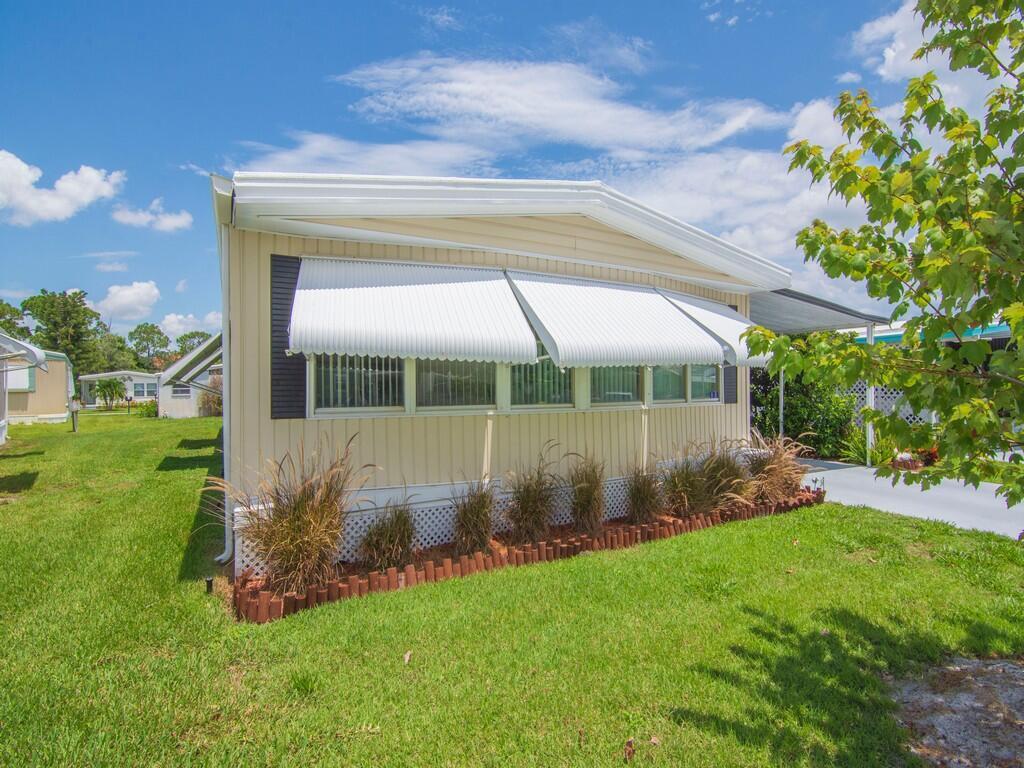 Welcome to 125 La Vaughn Circle in the sought-after 55+ community of Pinelake Village, Jensen Beach! This fully renovated 2-bedroom, 2-bath home offers 1,550 sq ft of bright, open living space in a quiet cul-de-sac. Enjoy brand-new laminate flooring and marble-tiled showers. Kitchen equipped with dishwasher, icemaker and convection oven. The roof was sealed in 2024, and the home features a tankless water heater (2020), updated electrical panel, and central A/C (inspected May 2024). This move-in ready home comes with walk-in closets and ample storage. The $765/month lot rent includes, cable, trash/recycling pickup, and taxes. Pinelake Village offers resort-style amenities including a pool, shuffleboard, and a clubhouse with regular community events. Located just 15 minutes from the beach!