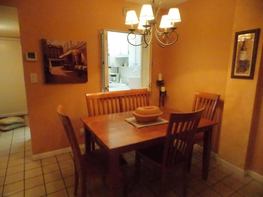 First floor corner renovated apt with new baths..white kitchen..Relaxing screened porch..Impact windows.All baths have walk in shower. Community has pool. Very close to much shopping/restaurants and close to bustling Mizner Park & Delray's Atlantic Avenue with boutiques..restaurants