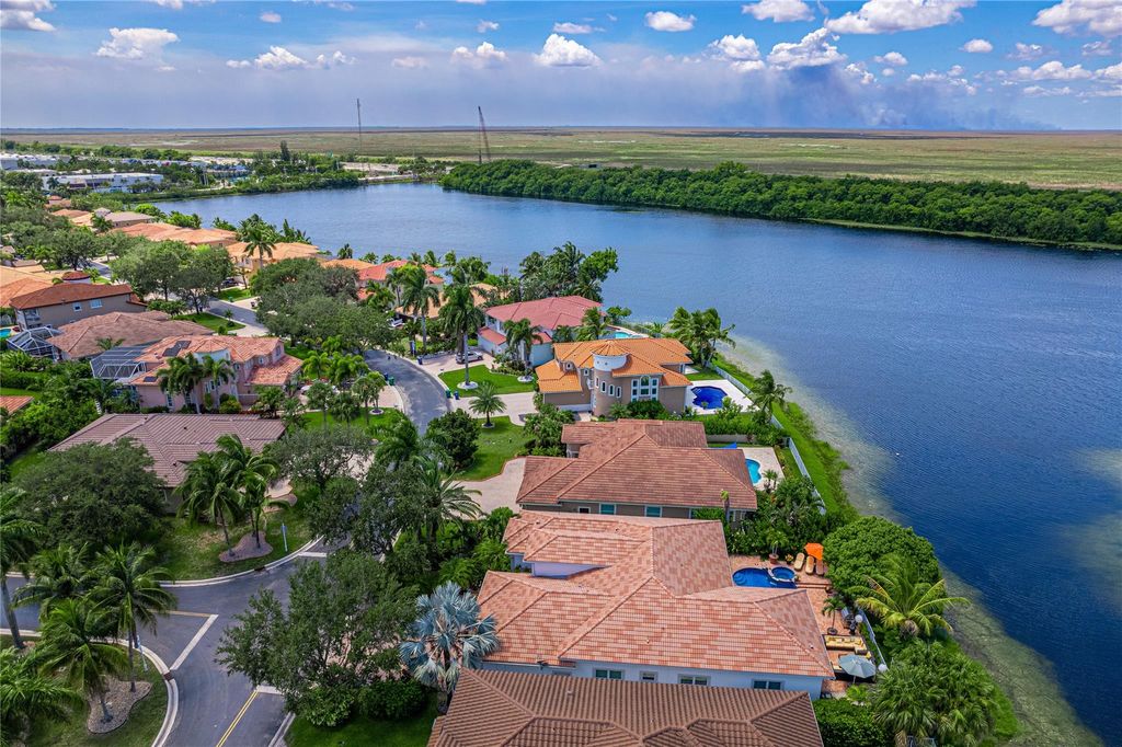Photo of 12307 NW 49th St, Coral Springs, FL 33076 (MLS # F10532831)