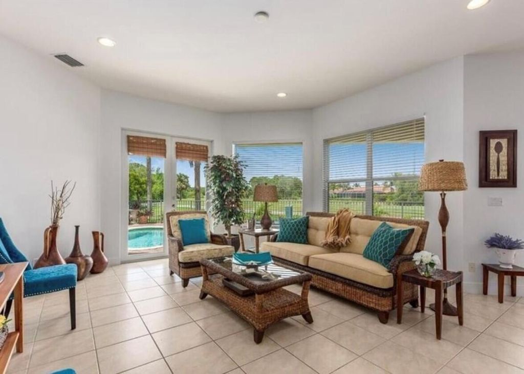 Photo of 850 SW Palm Cove Drive, Palm City, FL 34990 (MLS # R10940924)