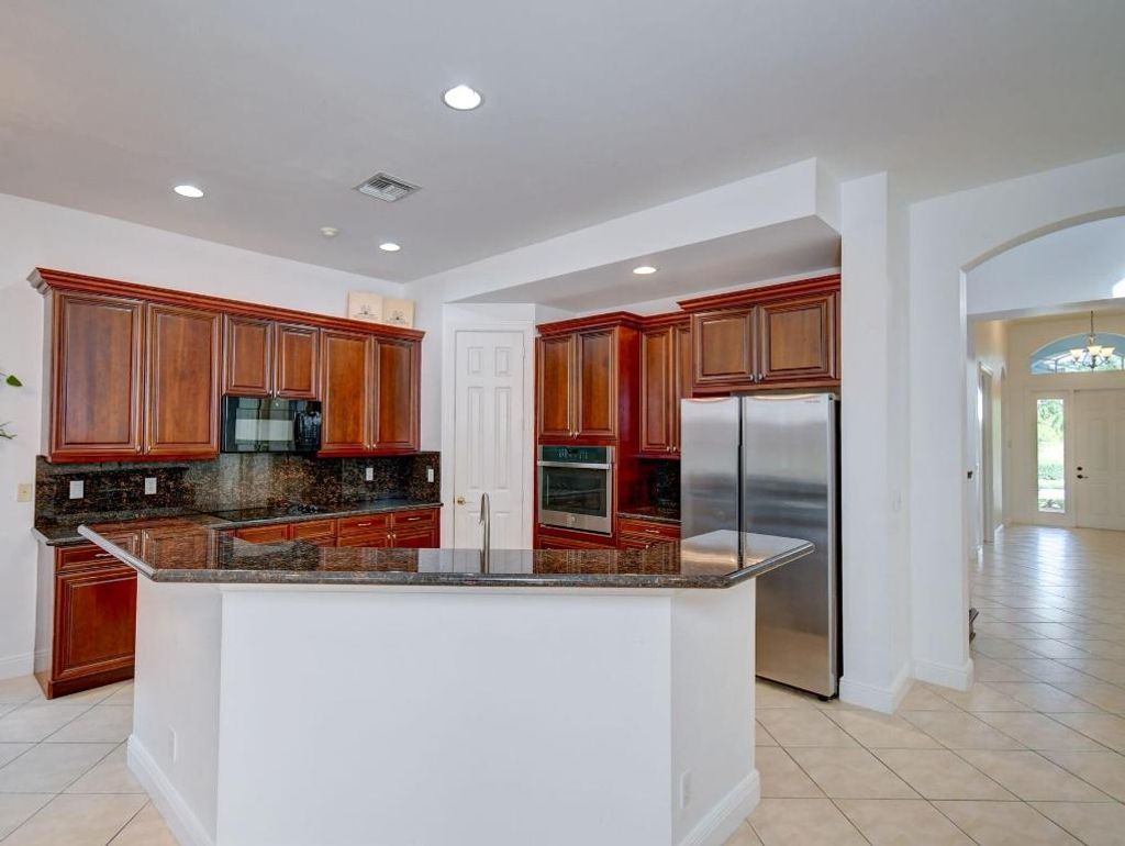 Photo of 850 SW Palm Cove Drive, Palm City, FL 34990 (MLS # R10940924)