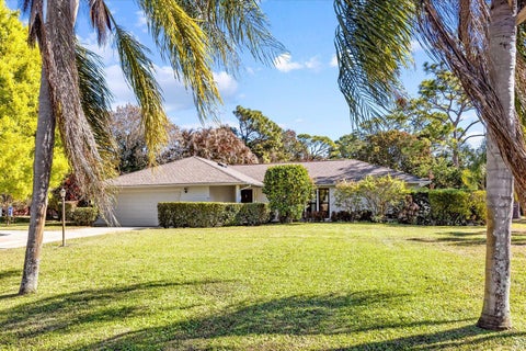 Photo of 571 NE TOWN Terrace, Jensen Beach, FL 34957 (MLS # B26076875)