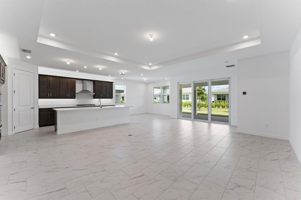Photo of 9857 SW Isabelline Drive, Port Saint Lucie, FL 34987 (MLS # R10889307)