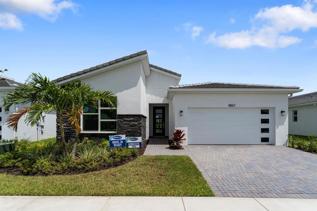 Photo of 9857 SW Isabelline Drive, Port Saint Lucie, FL 34987 (MLS # R10889307)