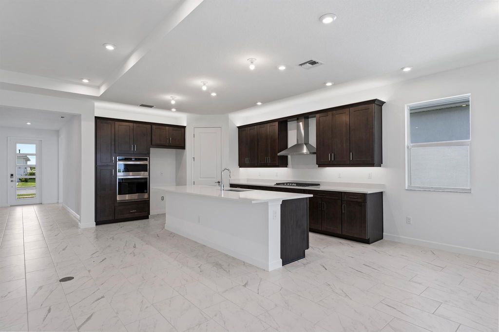 Photo of 9857 SW Isabelline Drive, Port Saint Lucie, FL 34987 (MLS # R10889307)