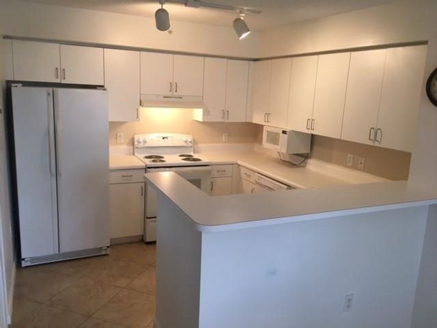 This is the one!! This bright, spacious & clean 2nd floor unit offers tile throughout the living areas and laminate wood flooring in the bedroom. NO Carpet!! Brand spankin' new GE stove. Pets OK up to 40 pounds! Full-size Washer & Dryer in Unit! Resort-style Community w/ Pool, BBQ/Picnic Areas, Fitness Center, Clubhouse, Tennis Courts & more! Water INCLUDED!! 1 minute drive to the Sawgrass Exspwy. Short drive to the Promenade & the Casino. 650+ credit score per association.