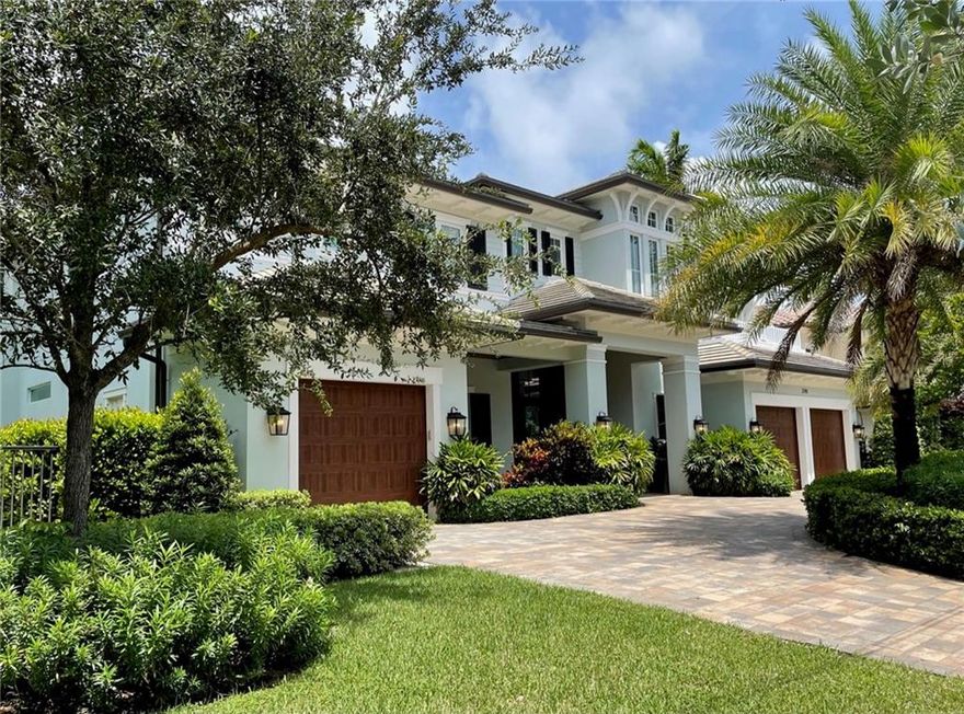 Coastal-Inspired 5 bedroom, 5.1 bath Masterpiece situated on an oversized 100 x 120+/ foot lot just three from the point. 100' of unobstructed ocean access waterfront. New Seawall cap and batter pilings. New Construction build in 2017 showcasing open floor plan with 13' ceilings in main living area, floor-to-ceiling glass doors open to waterfront patio, marble flooring on first floor, wide wood plank flooring on second floor. Master bath offers separate water closets.  All rooms have built-in closets. Bonus room off master suite. 48" dual fuel range, separate refrigerator and freezer tower, walk up bar with wine cooler and sink, Generator, putting green, tongue and groove wood accent ceilings. Upstairs and downstairs laundry. Elevator