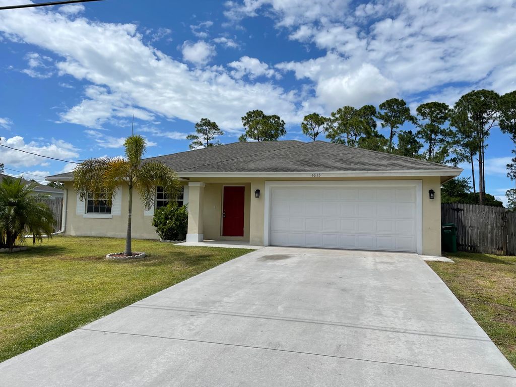 Photo of 1633 SW Hextel Avenue, Port Saint Lucie, FL 34953 (MLS # R10799485)