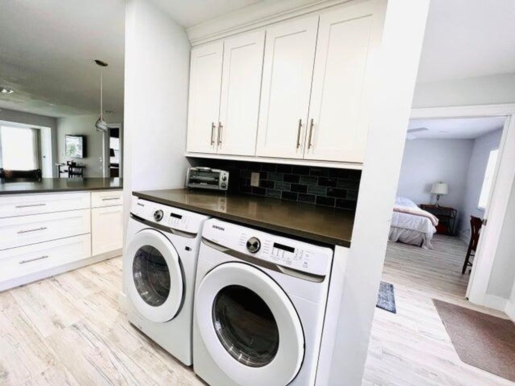 Photo of 1360 NW 19th Ter #202, Delray Beach, FL 33445 (MLS # R11051327)