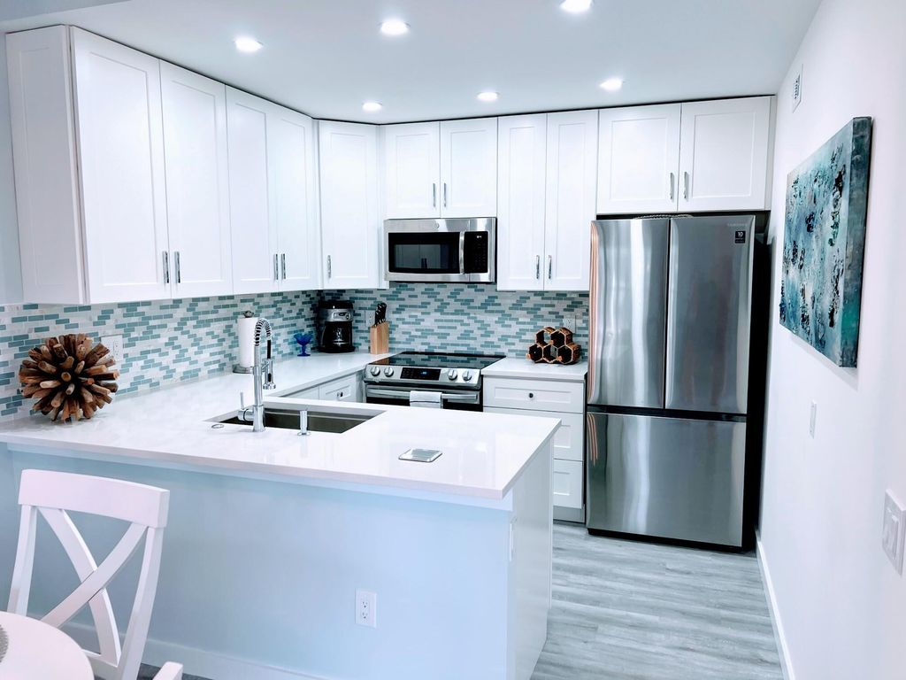 Photo of 647 Waterside Drive, Hypoluxo, FL 33462 (MLS # R11080539)