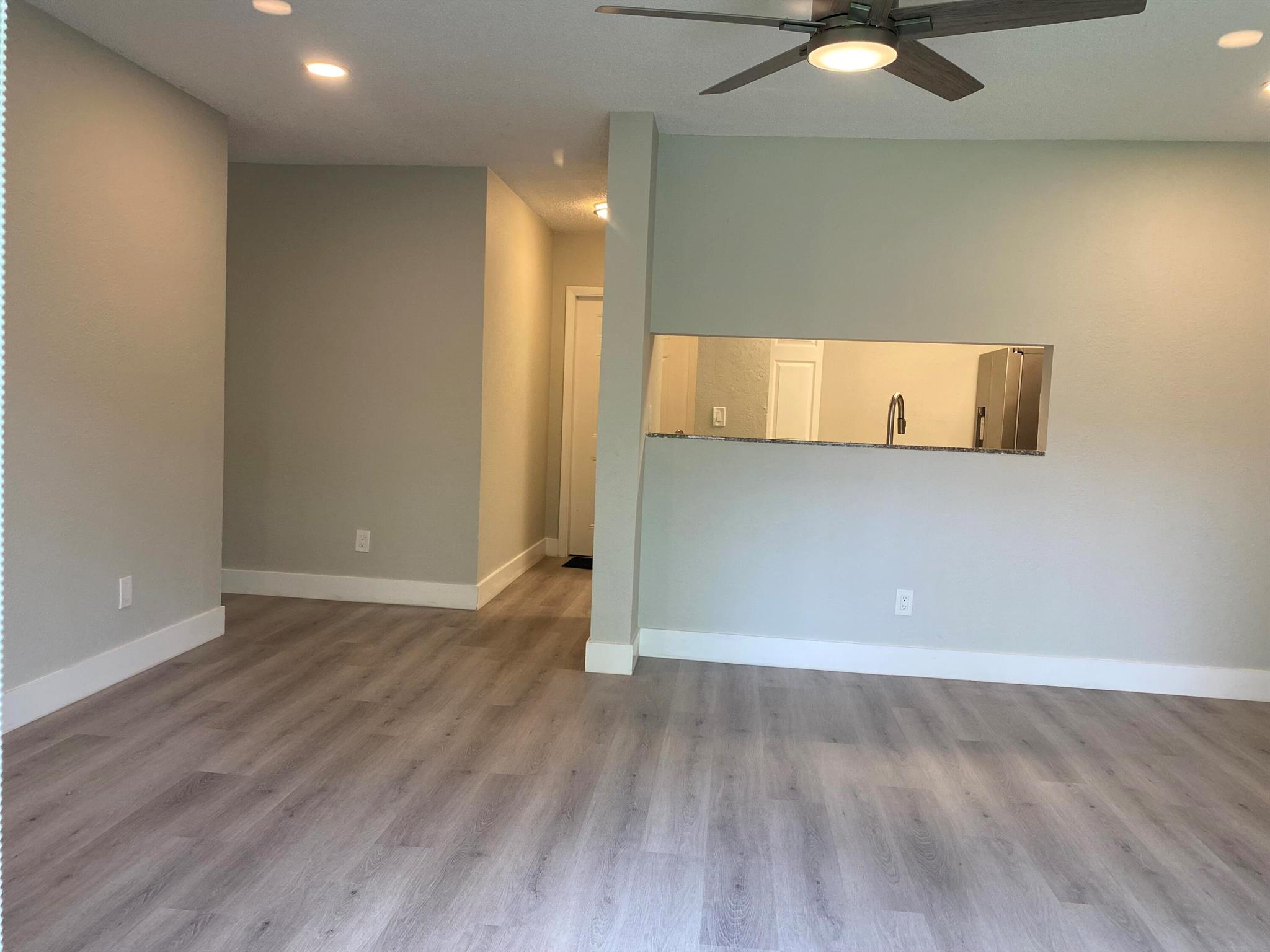 COMPLETELY UPDATED AND MODERN! This immaculate 3 bedroom / 2 bathroom unit is ready for immediate move in! This first floor unit will wow you the moment you enter. Everything has just been renovated. Brand new kitchen appliances, granite countertops, backsplash, laminate floors, vanities, light fixtures, fans, window treatments, freshly painted, brand new private washer and dryer in storage unit on patio and so much more. Fast approval process. Don't miss your opportunity. Call now. Close to all shopping, supermarkets, parks, schools and major highways.