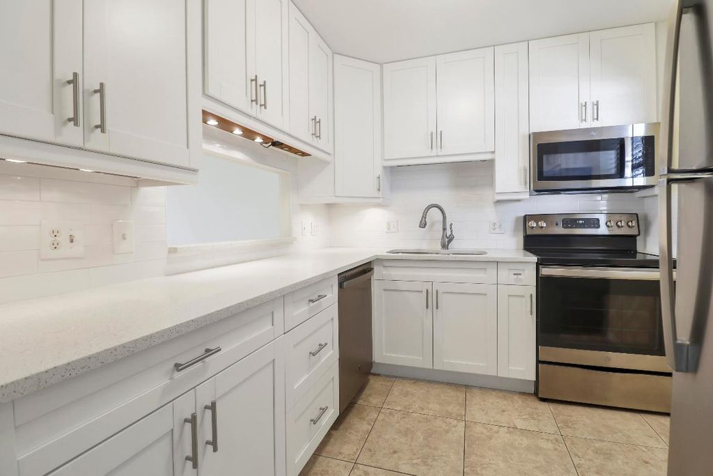 Photo of 12016 Greenway Circle S #204, Royal Palm Beach, FL 33411 (MLS # R11154975)