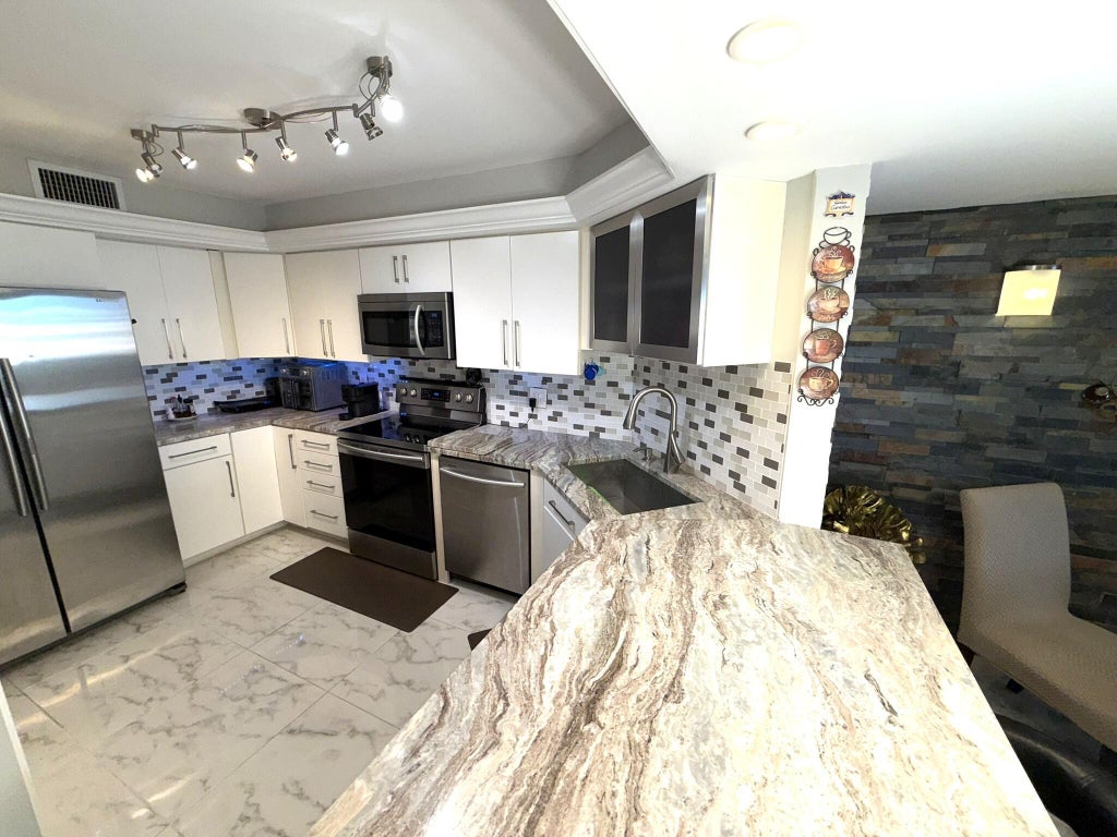 Photo of 2425 Presidential Way #1804, West Palm Beach, FL 33401 (MLS # R11094913)