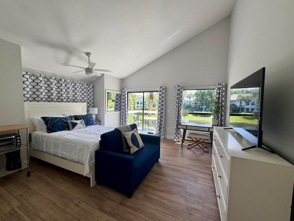 Photo of 11863 Wimbledon Circle #536, Wellington, FL 33414 (MLS # B26016053)