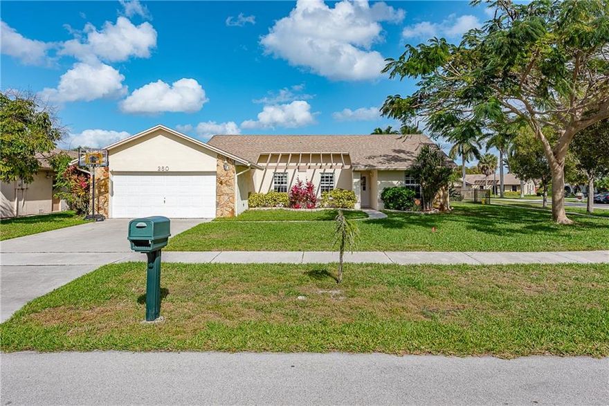 WOWZER!!! A BEAUTIFUL HOUSE ON AN OVERSIZED CORNER LOT, LOTS OF UPGRADES AND RENOVATIONS, REMODEL BATHROOMS, UPGRADED KITCHEN WITH GRANITE COUNTER TOPS, NEWER APPLIANCES, LAMINATED WOOD FLOORS, SPLIT BEDROOM PLAN, VAULTED CEILINGS, COVERED SCREEN PATIO, FENCED YARD, IMPACT WINDOWS, HOUSE SHOWS GREAT. CLOSE TO TURNPIKE, I95 AND SAWGRASS EXPRESSWAY.