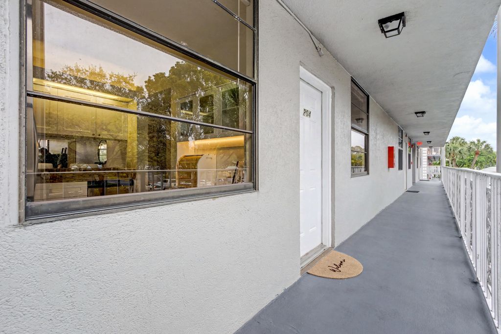 Photo of 1518 Whitehall Drive #204, Davie, FL 33324 (MLS # B26016621)