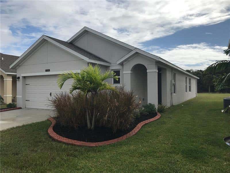 Photo of 11181 SW Sophronia Street, Port Saint Lucie, FL 34987 (MLS # R10698254)