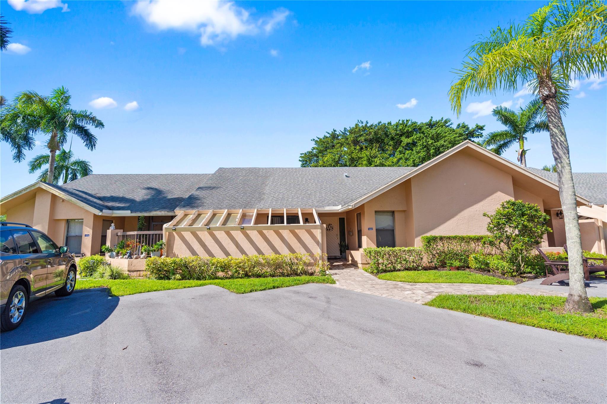 Live the relaxed South Florida lifestyle in this beautifully upgraded villa in the active 55+ community of Waterberry at Boca Chase. This light-filled home features vaulted ceilings, a remodeled kitchen with shaker cabinets, granite countertops, and stainless steel appliances—perfect for cooking and entertaining. Enjoy a spacious primary suite with an oversized walk-in closet, indoor laundry room, and a Florida room ideal for morning coffee or unwinding with a book. The open floor plan invites easy living, with same flooring throughout home. Large storage closet. 2 cars ok. Pet-friendly community (2 pets under 20 lbs) offers a variety of social activities and amenities. Conveniently located near shopping, dining, and major roads for effortless access to everything you need.