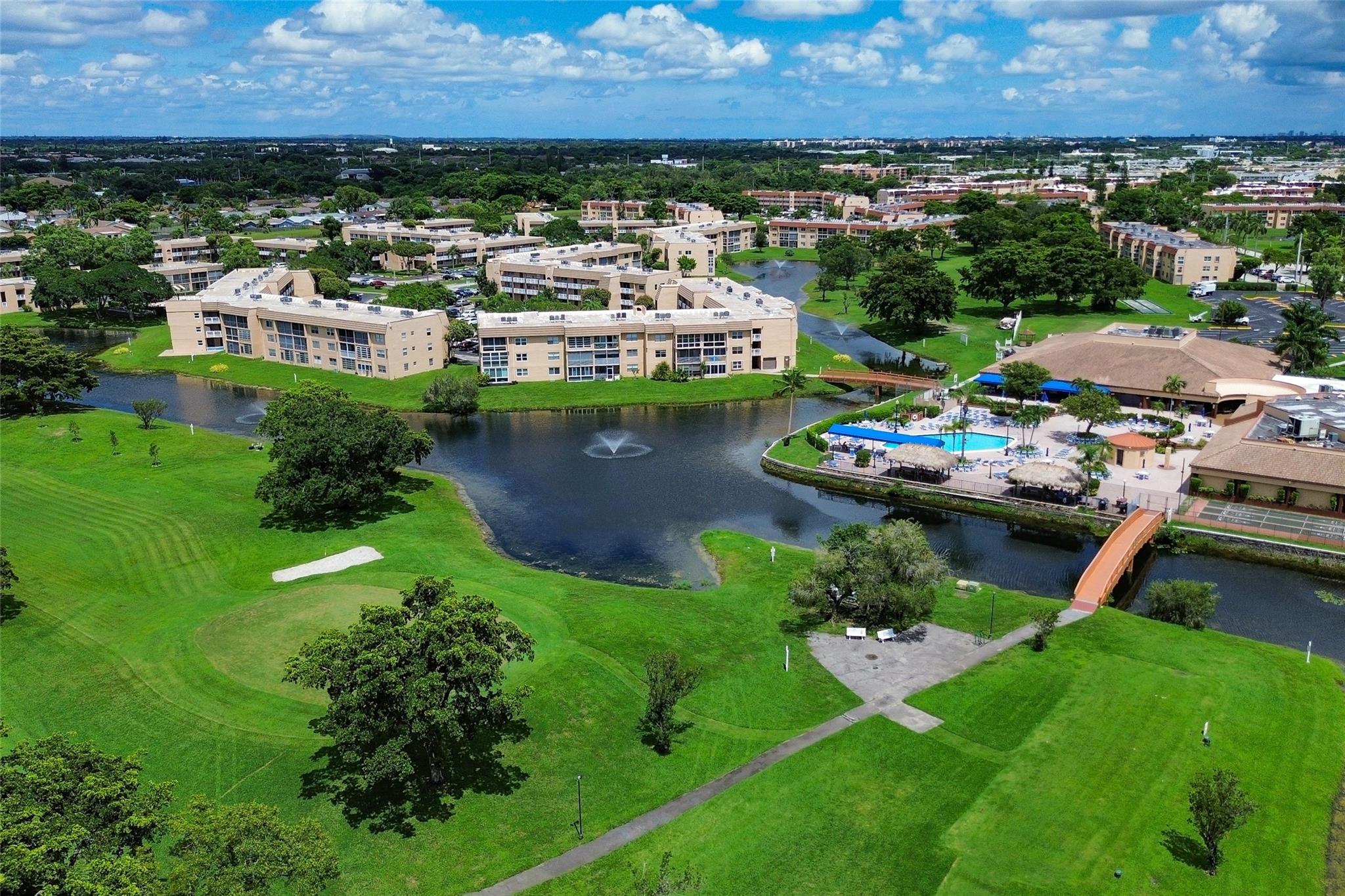 Wake up to tranquil water views in this stunning 2-bedroom, 2-bathroom waterfront condo, nestled in the highly sought-after Sunrise Lakes Community. You'll love sipping your morning coffee or unwinding in the evening from your enclosed Florida room, a versatile space which can be used for a home office, a bonus room, or simply a peaceful retreat.
The community is a paradise of resort-style amenities. Stay active with multiple outdoor pools, an indoor pool, a state-of-the-art fitness center, racquetball, a lovely golf course and tennis courts. Enjoy social gatherings in the billiard room or the spacious ballroom. This condo offers the perfect blend of quiet tranquility and vibrant, active living. Don't miss this opportunity to embrace the Florida lifestyle you've always dreamed of!