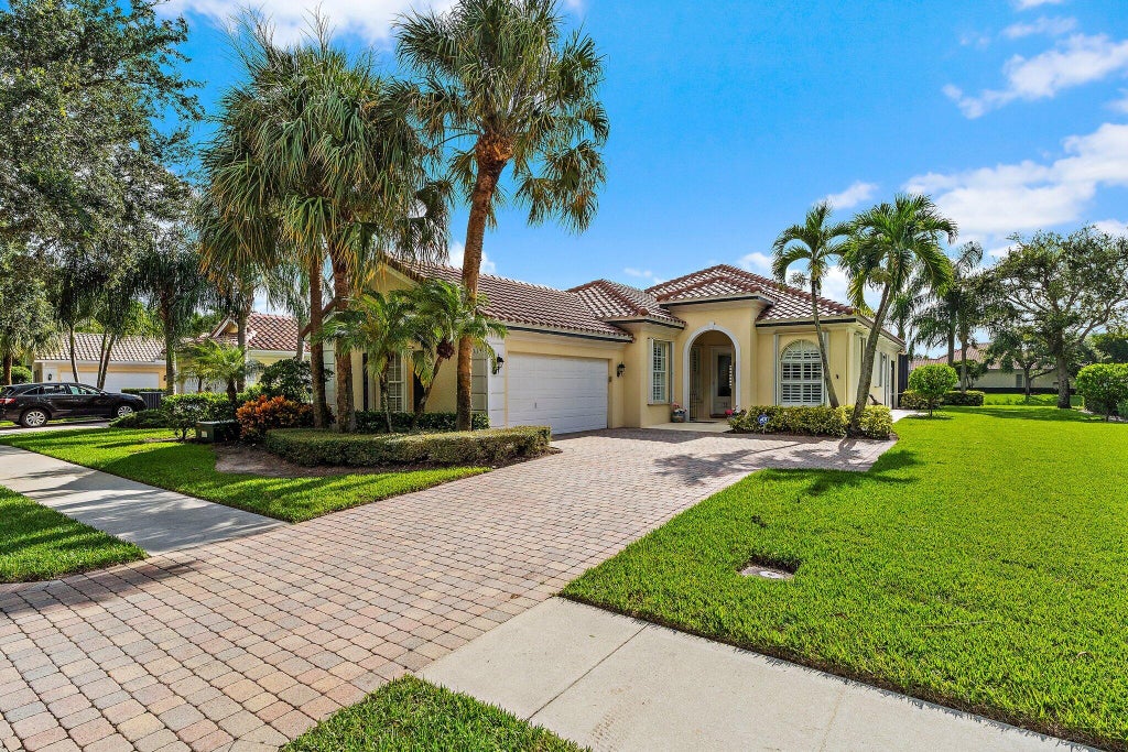 Photo of 108 Euphrates Circle, Palm Beach Gardens, FL 33410 (MLS # B26068827)