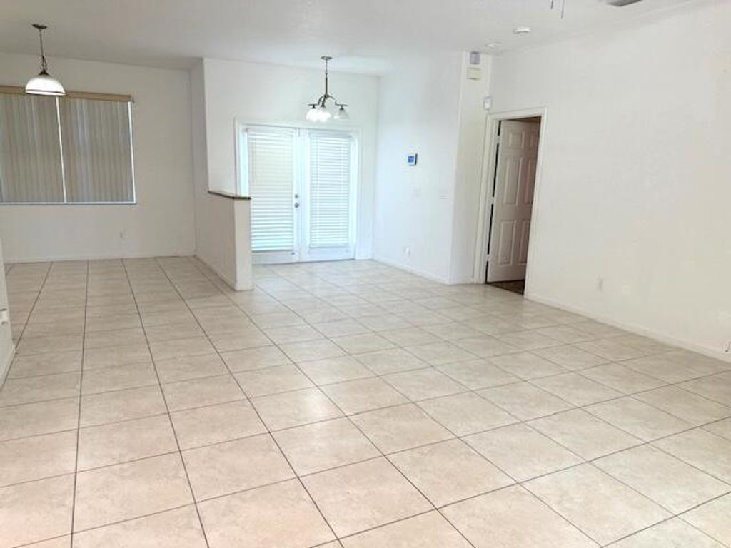 Photo of 2619 SW Ann Arbor Road, Port Saint Lucie, FL 34953 (MLS # B26018396)