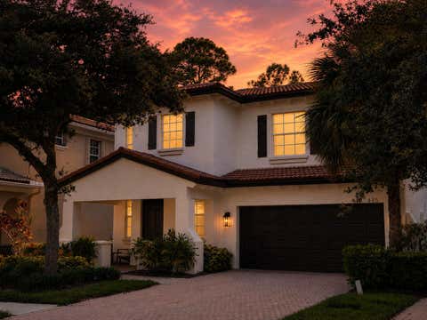 Photo of 445 PUMPKIN Drive, Palm Beach Gardens, FL 33410 (MLS # B26063123)