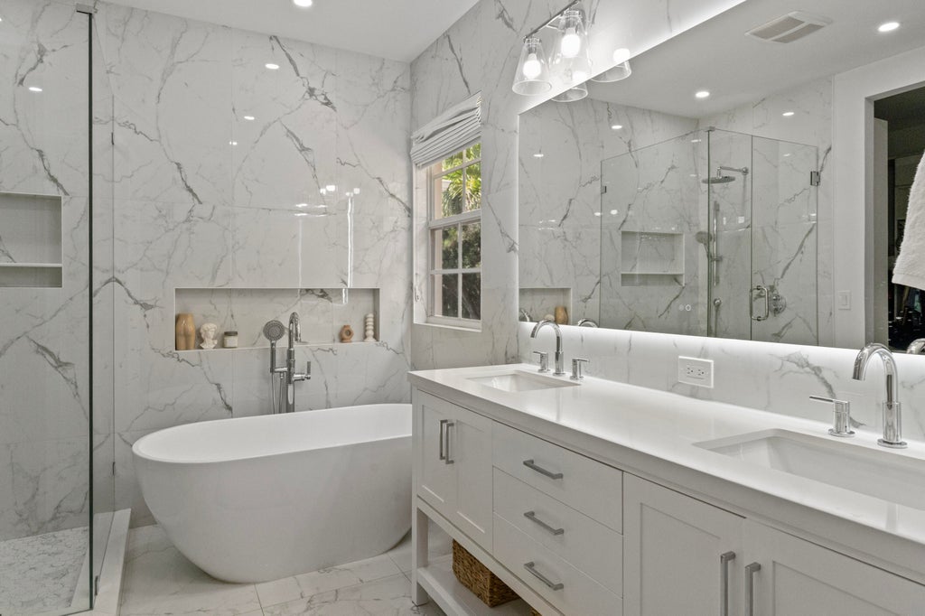 Photo of 445 Pumpkin Drive, Palm Beach Gardens, FL 33410 (MLS # B26063123)