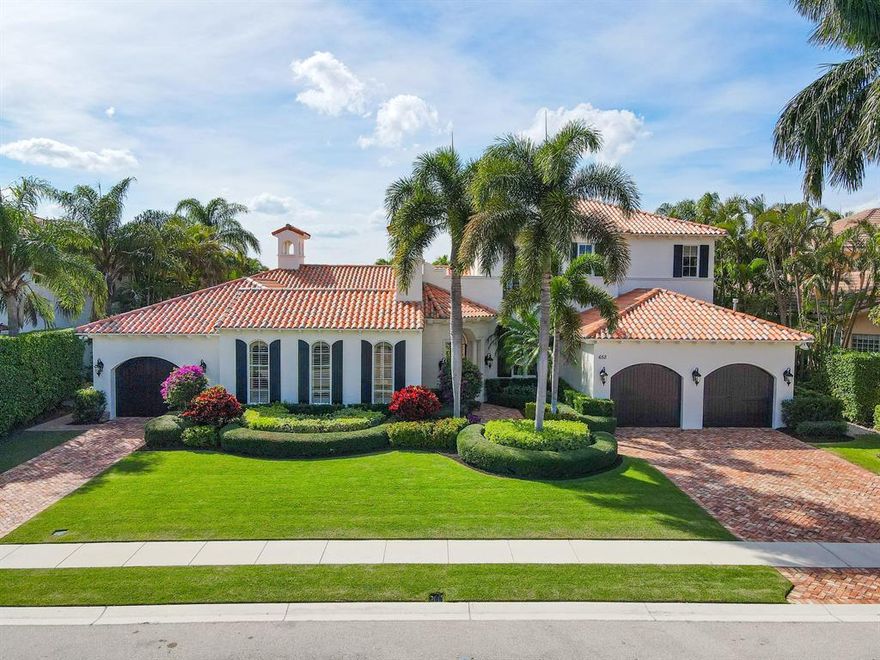 Elegant Palm Beach Curb Appeal, Sunset Lake and Golf Views. This custom Tuscan Harvey Estate is situated on an oversized lot and offers 5 bedrooms with ensuite bathrooms, 2 additional half baths, and a large study with fireplace. This spacious floorplan is beautifully sprawled out over 6,500+ square feet, allowing comfort and privacy for all. A secluded, heated pool and spa overlook the lake and golf course with unparalleled vista of sunshine all day and pristine sunsets each night. Formal living and dining rooms flank the entrance with wall-to-wall windows allowing light throughout the day. The brand new kitchen boasts porcelain countertops, brass fixtures, a 6-top Thermador range and double oven, with SubZero fridge and freezer plus a butler's pantry.