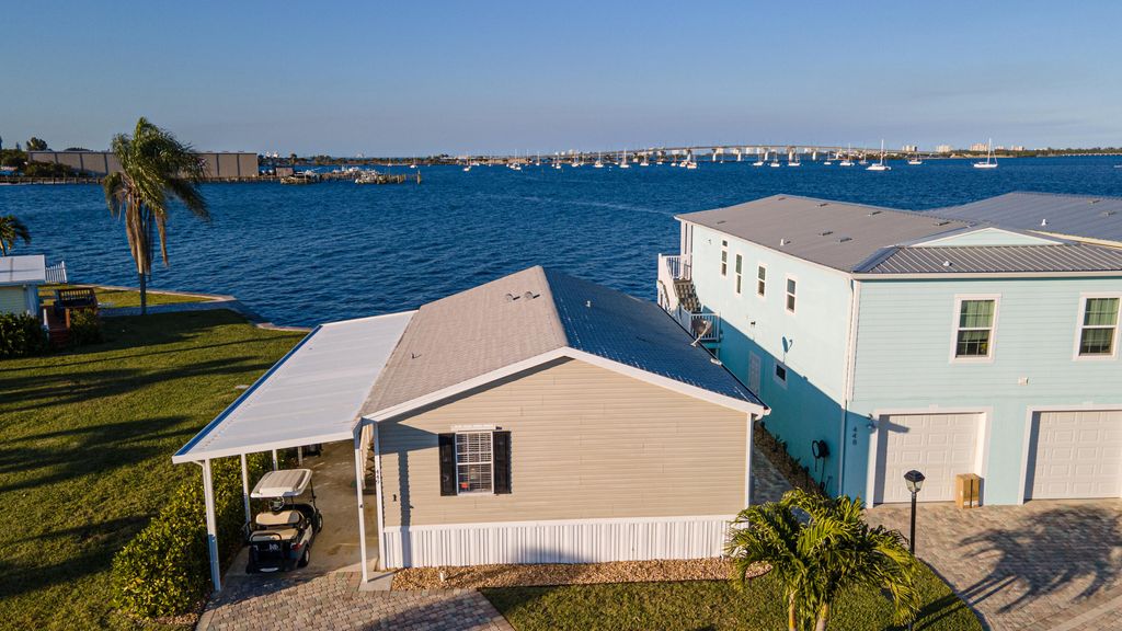 Photo of 449 NE Pier Way, Jensen Beach, FL 34957 (MLS # R10859708)